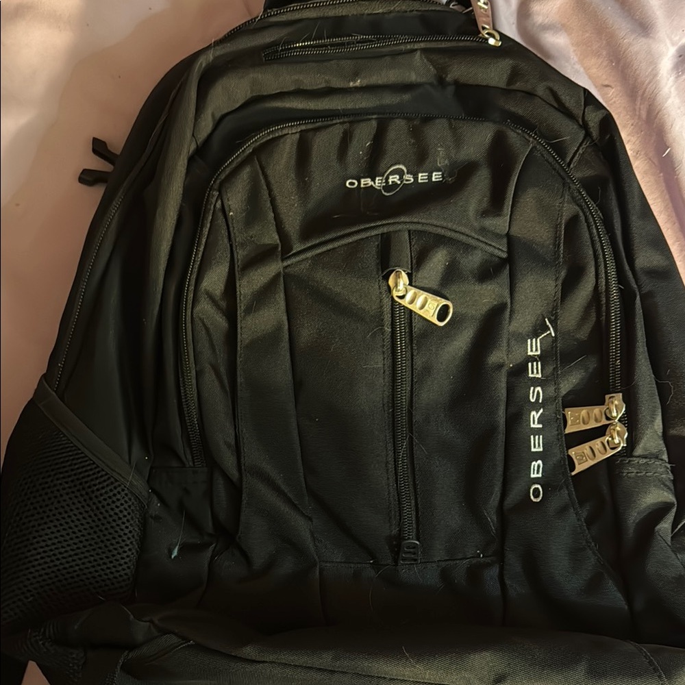 Black Backpack with Structured Design and Ample Storage